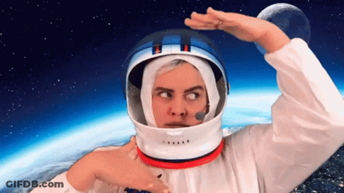 Astronaut Looking Over Shoulder At Earth GIF