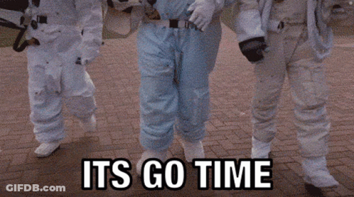Astronauts Walking On Brick Sidewalk Saying Its Go Time GIF