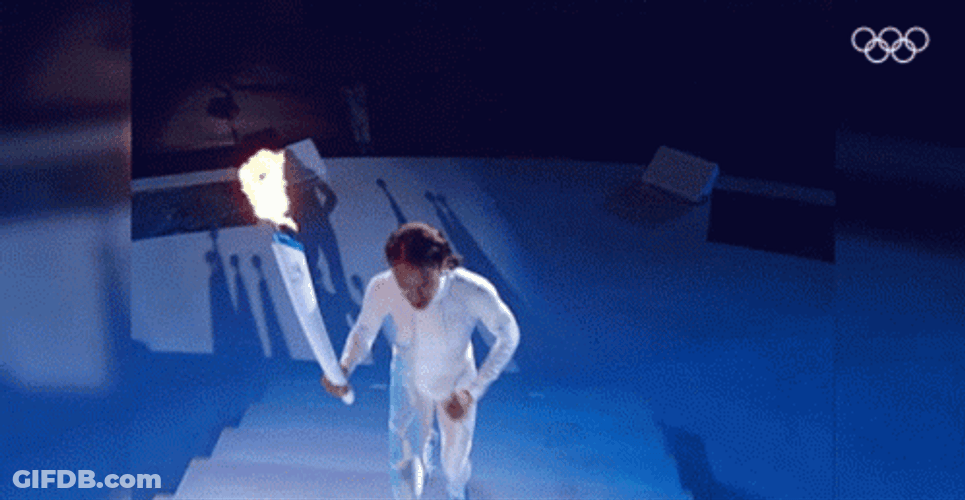 Athlete In Olympic Torch Lighting GIF