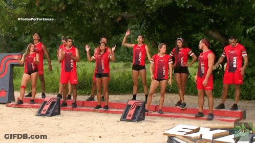 Athletes In Red Uniforms With Matt GIF