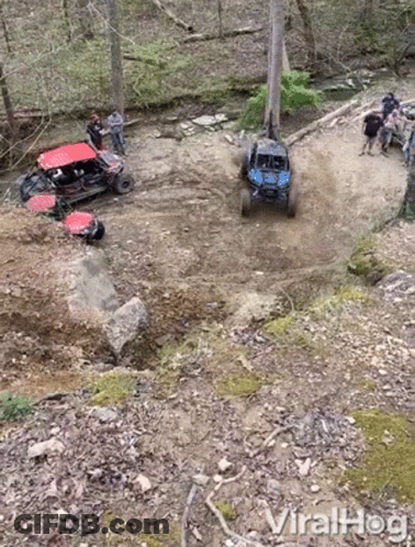 ATVs Driving Down Dirt Road In Woods Viralhog GIF