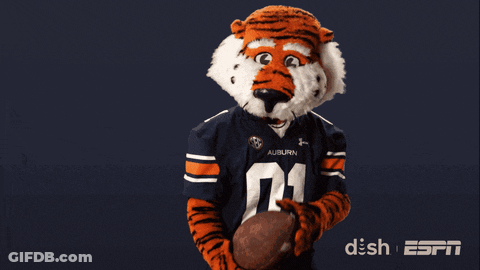 Auburn Football Mascot Holding Football GIF