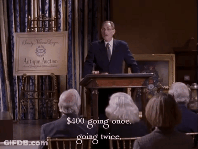 Auctioneer Calling For Bidders GIF