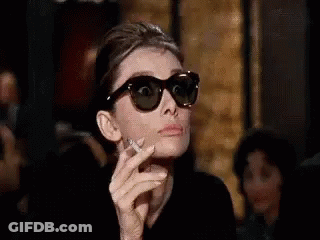 Audrey Hepburn Smoking With Sunglasses GIF