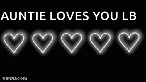Auntie Loves You Lb Is Written On A Black Background With Hearts Glowing In The Dark . GIF
