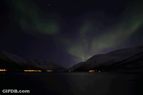 Aurora Borealis Shining Over Lake GIF
