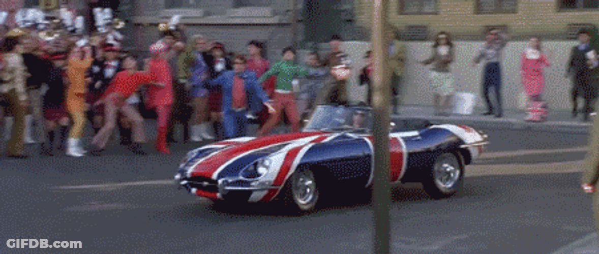 Austin Powers Jumping Into His Car GIF
