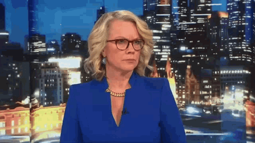 Australian Journalist Laura Tingle Taking Notes GIF