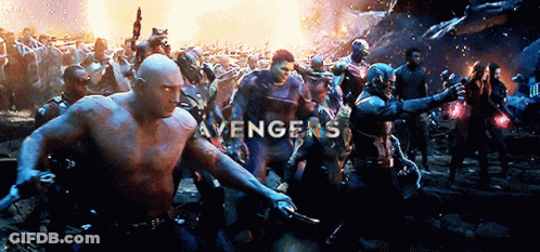 Avengers Standing In Front Of Fire GIF