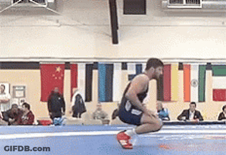 Awkward Bend Over Wrestling Match Pose GIF