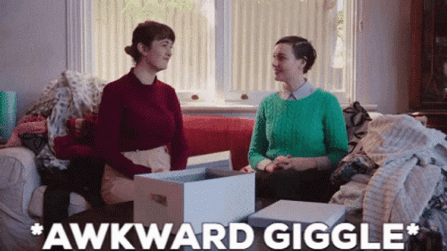 Awkward Giggle GIF