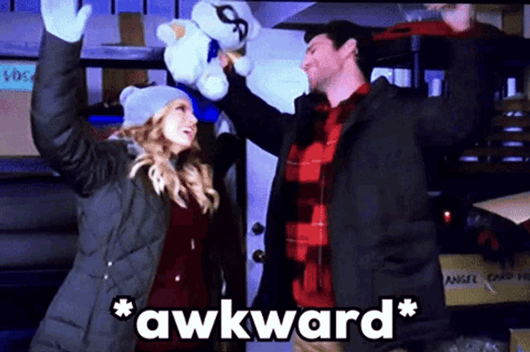 Awkward Happy Christmas Couple GIF