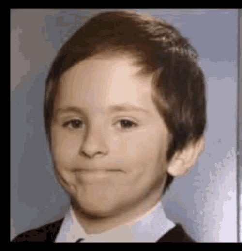 Awkward Smile Freddie Highmore GIF