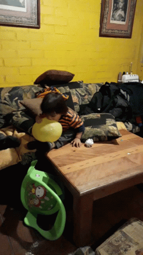 Baby Boy Bite Balloon Pop GIF