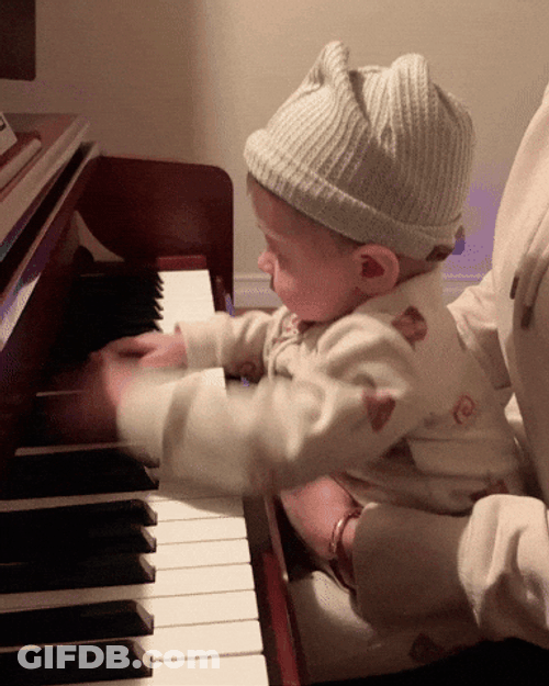Baby Boy Playing Piano GIF