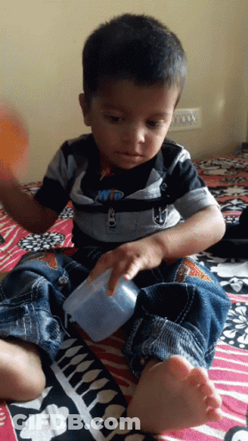 Baby Boy Puts Powder GIF
