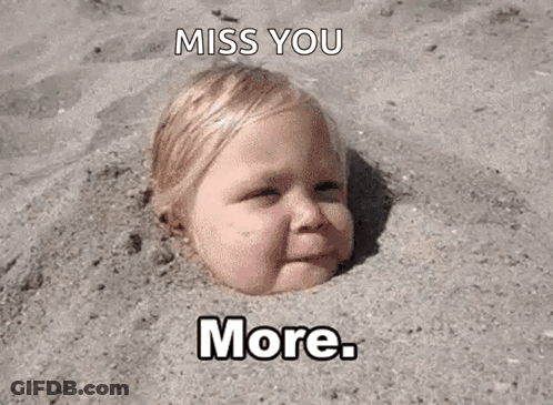 Baby Buried In Sand GIF
