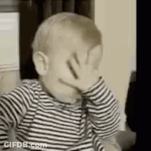Baby Covering Face In Black And White Striped Shirt GIF