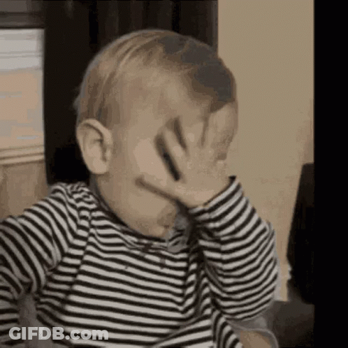 Baby Covering Face In Striped Shirt GIF