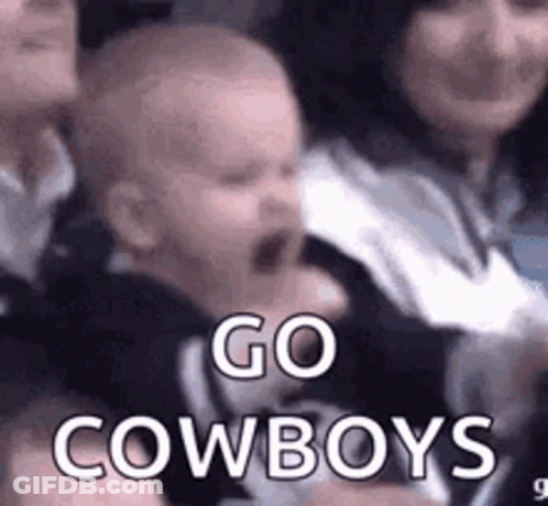 Baby Crying In Crowd Held By Woman GIF