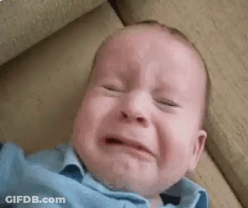 Baby Crying On Couch With Eyes Closed GIF