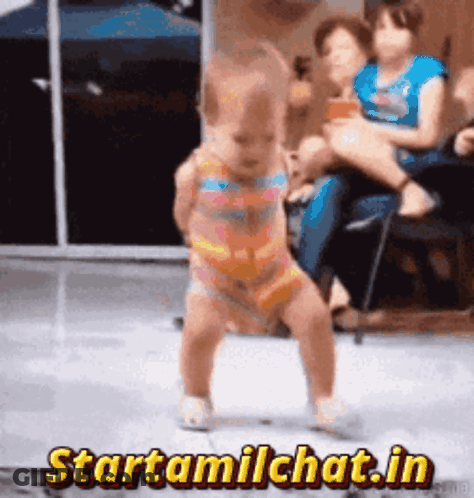 Baby Dancing In Front Of Starttamilchat Sign GIF