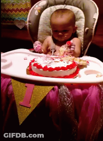 Baby Dancing On Tiled Floor While Woman Holds Another Baby GIF