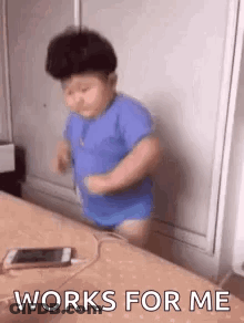 Baby Dancing With Cell Phone GIF