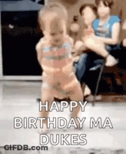 Baby Dancing With Woman Holding Baby In Background GIF