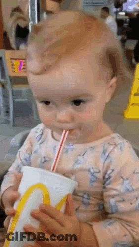 Baby Drinking From McDonald's Cup With Straw GIF