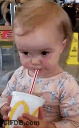 Baby Drinking From McDonald's Cup With Straw GIF