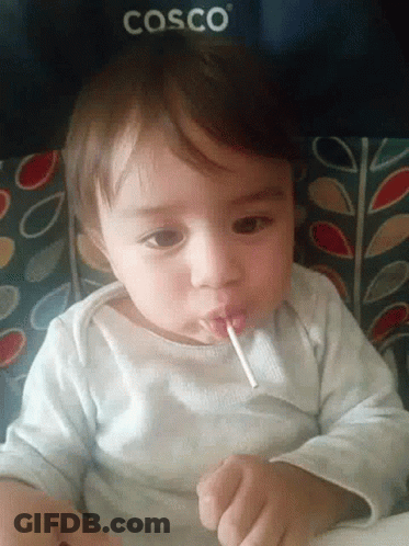 Baby Drinking From Straw In Cosco Chair GIF