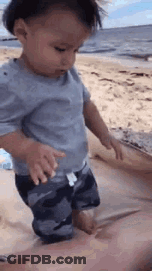 Baby Enjoying The Beach GIF