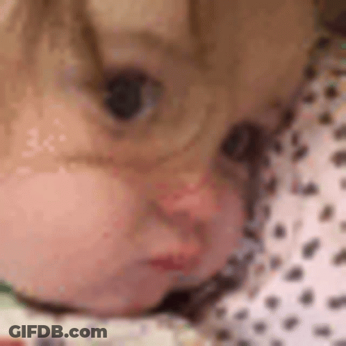 Baby Face Closeup On Blanket GIF