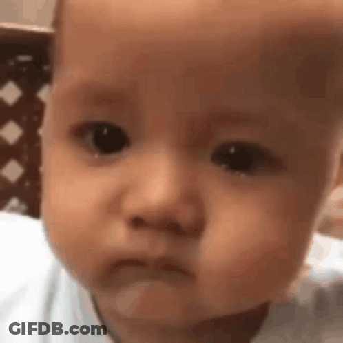 Baby Face With Sad Expression GIF