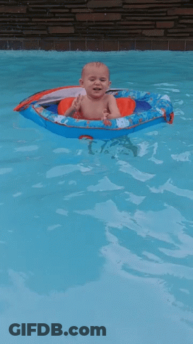 Baby Floating In Boat In Pool GIF