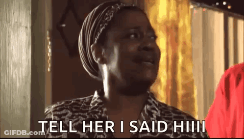 Baby Funny Face Green Shirt In Woman's Arms GIF
