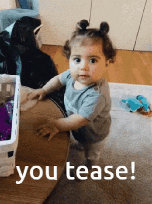 Baby Giggles To Tease GIF