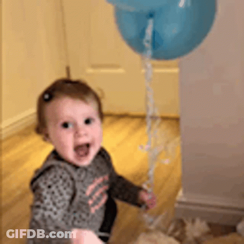 Baby Girl Holding Blue Balloon GIF