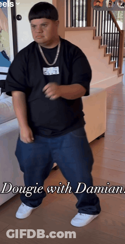 Baby Girl Holding Lollipop Making Funny Face GIF