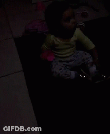 Baby Girl Holding Pink Cup GIF