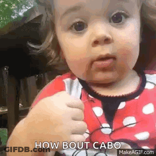Baby Girl In Minnie Mouse Outfit Making Funny Face GIF