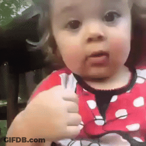 Baby Girl In Minnie Mouse Outfit Thumbs Up GIF