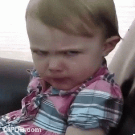 Baby Girl In Plaid Dress Funny Face Car Seat GIF