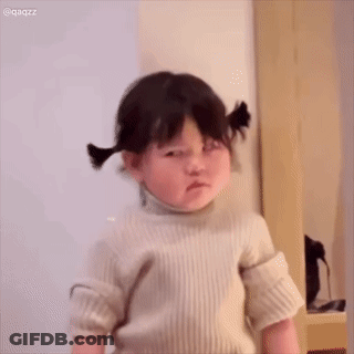 Baby Girl Making Funny Face Holding Ears GIF