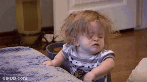 Baby Girl On Couch Eyes Closed Funny Face GIF