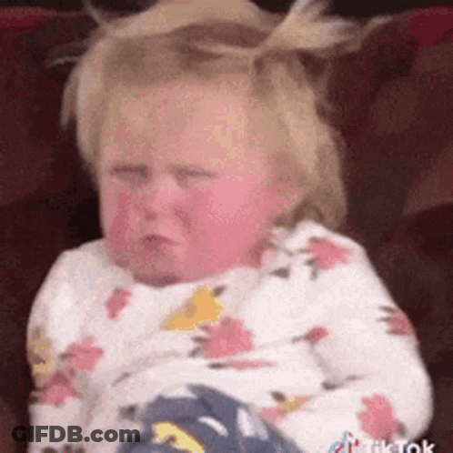 Baby Girl Sitting On Couch Crying GIF