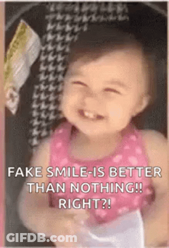 Baby Girl Smiling Holding Book GIF