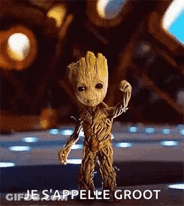 Baby Groot Flexing Muscles In Front Of Building GIF