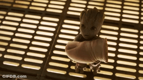 Baby Groot Held By Person's Arm GIF